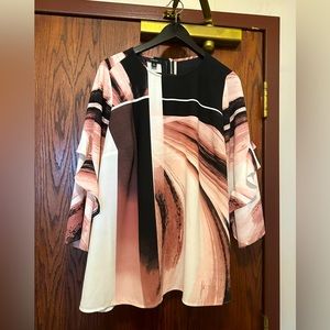 Womens blouse size 1 X with zipper detailing in back and detailing in sleeves